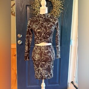 PrettyLittleThing Black and White Abstract Dress with cutout. NWT size 4